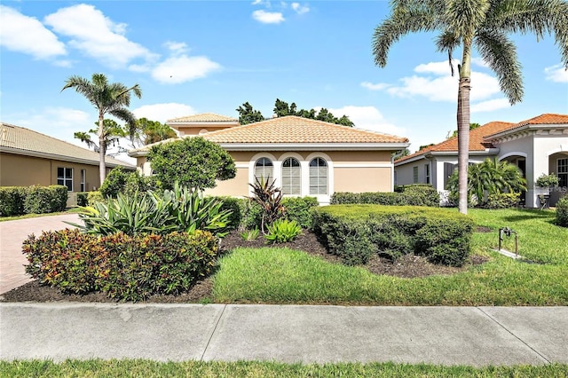 134 Savona Way N, Venice, FL 34275 - mediterranean / spanish house with stucco siding and a tiled roof