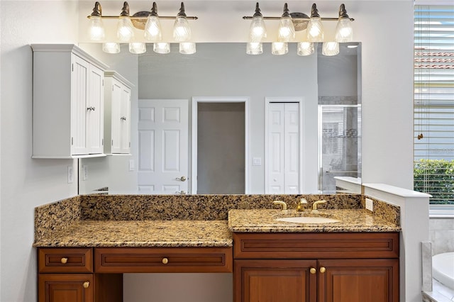 bathroom featuring vanity and separate shower and tub