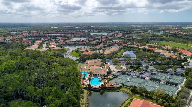 drone / aerial view with a water view