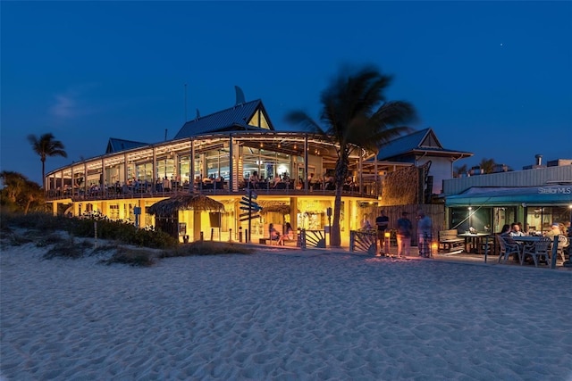 view of back house at night