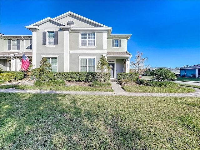 view of front of home featuring a front lawn