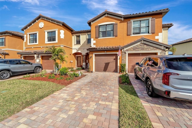 view of front of property featuring a garage