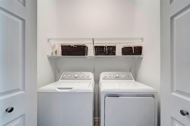 laundry room with washer and dryer