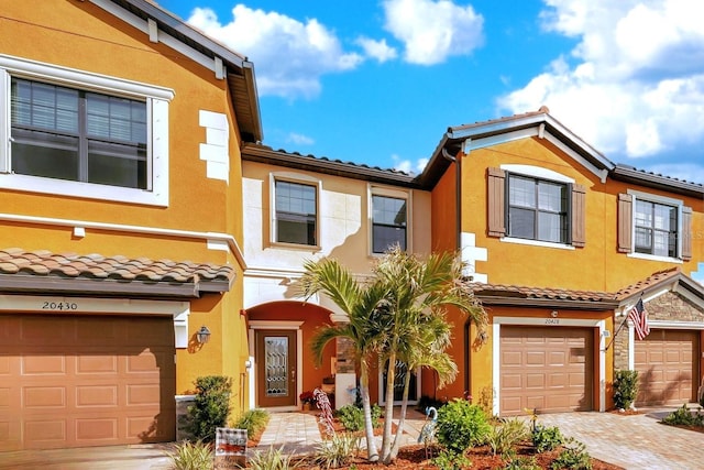 view of front of property with a garage