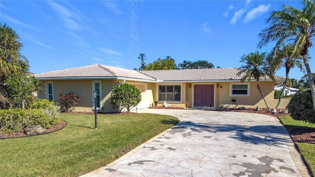 ranch-style house featuring a front lawn