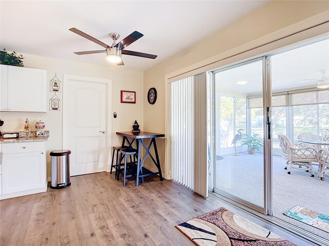 4 Windsor Dr, Englewood, FL 34223 - interior space featuring light wood-style flooring and a ceiling fan