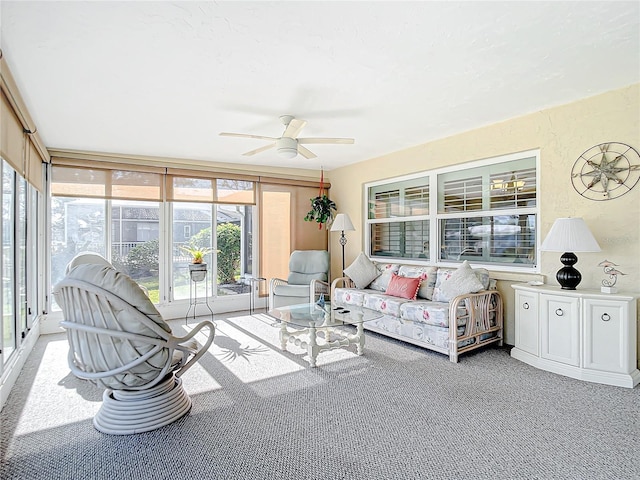 4 Windsor Dr, Englewood, FL 34223 - living room featuring a healthy amount of sunlight, ceiling fan, and carpet