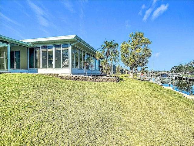 4 Windsor Dr, Englewood, FL 34223 - view of yard featuring a sunroom