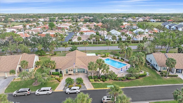 1211 Capri Isles Blvd Unit 58, Venice, FL 34292 - aerial perspective of suburban area with a pool area