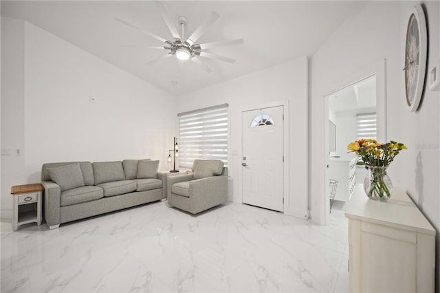 living room with vaulted ceiling and ceiling fan