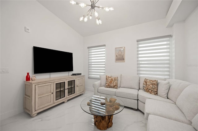 living room with vaulted ceiling and a notable chandelier