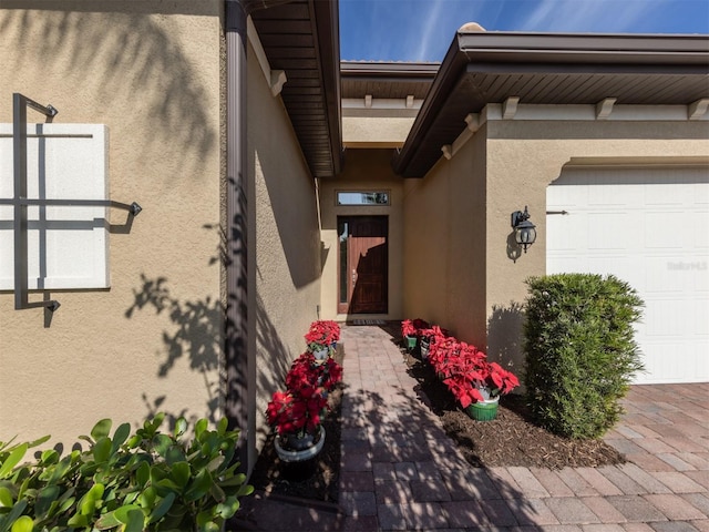 entrance to property featuring a garage