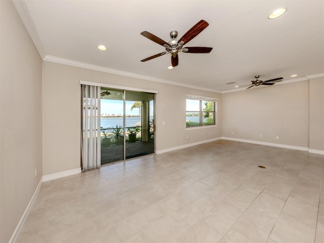 spare room with light tile patterned floors, a water view, ceiling fan, and ornamental molding