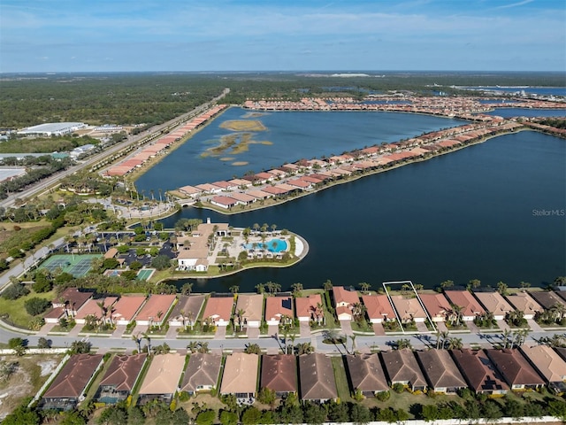 birds eye view of property featuring a water view