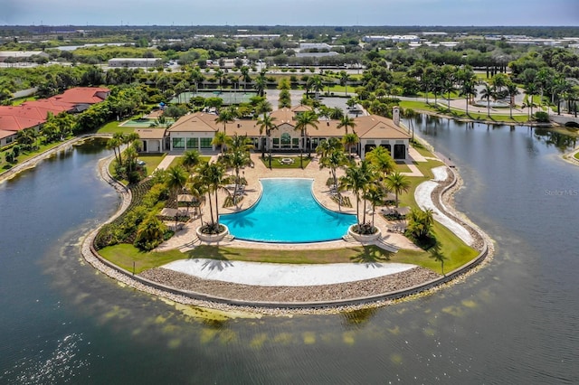 birds eye view of property featuring a water view