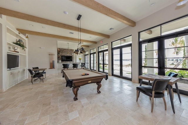 playroom featuring beam ceiling, french doors, and billiards