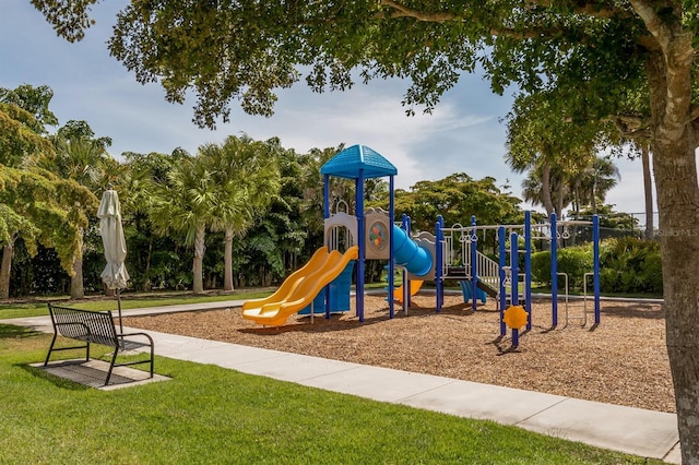 view of playground with a yard