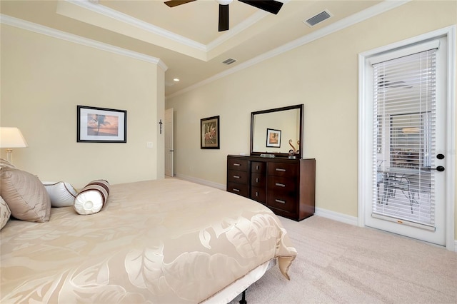 bedroom with light carpet, access to outside, a raised ceiling, ceiling fan, and ornamental molding