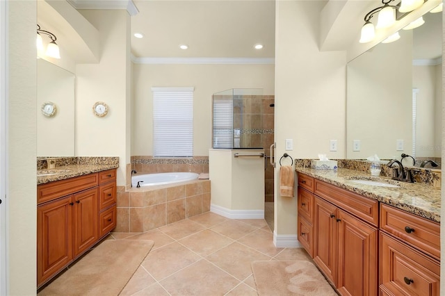 bathroom with tile patterned flooring, vanity, independent shower and bath, and crown molding