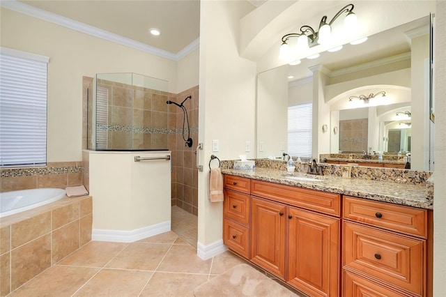 bathroom with tile patterned floors, vanity, crown molding, and independent shower and bath