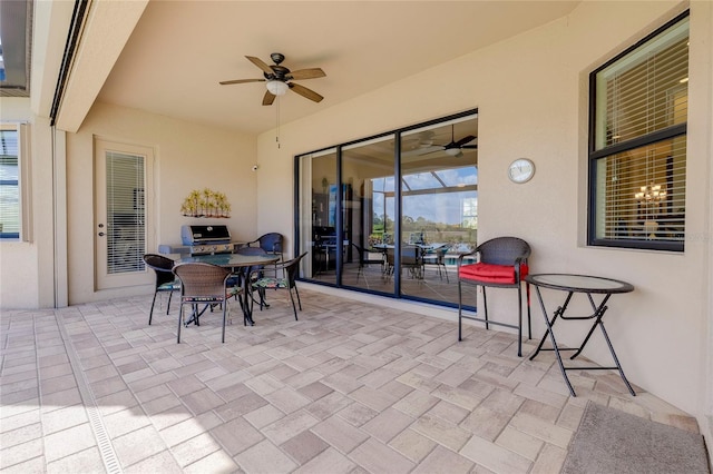 view of patio / terrace featuring ceiling fan