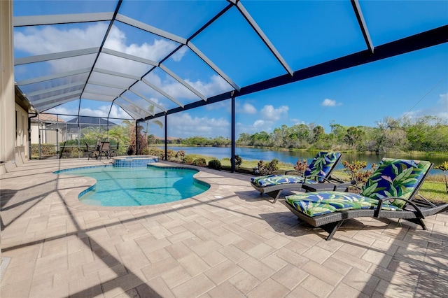 view of pool featuring a patio area, a lanai, an in ground hot tub, and a water view