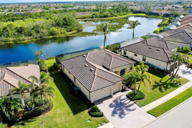 birds eye view of property featuring a water view