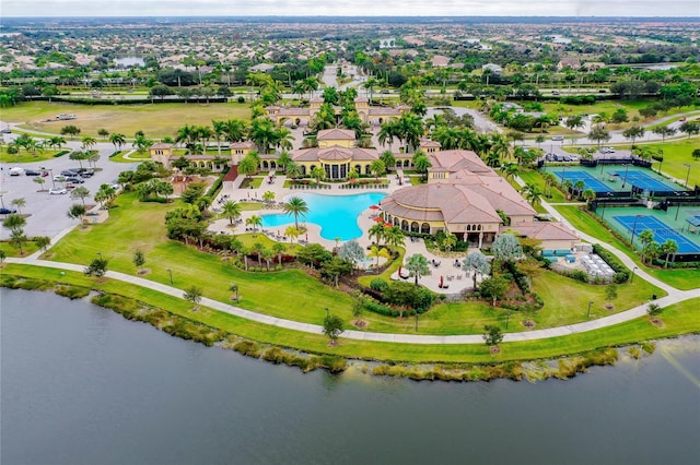 birds eye view of property with a water view