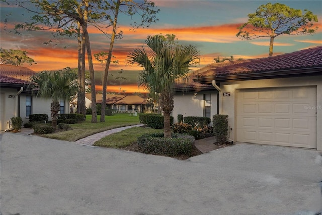 view of front of home with a garage