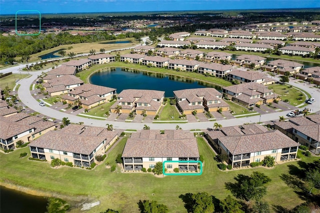 bird's eye view with a water view