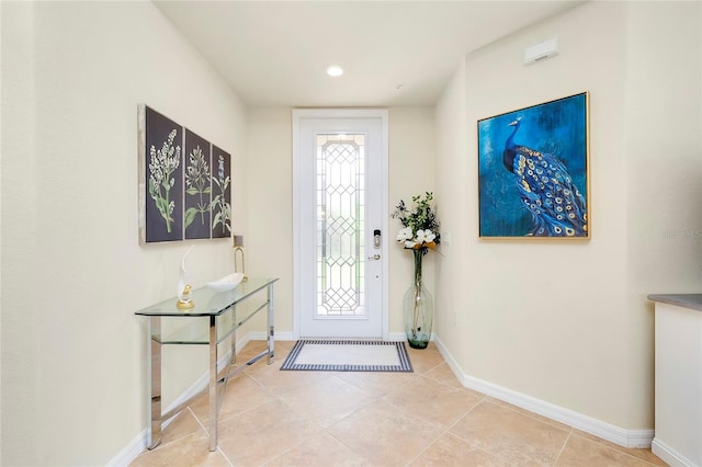 20100 Ragazza Cir Unit 101, Venice, FL 34293 - entryway with tile patterned flooring and recessed lighting