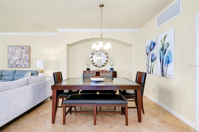 20100 Ragazza Cir Unit 101, Venice, FL 34293 - dining space with a chandelier, crown molding, and light tile patterned floors