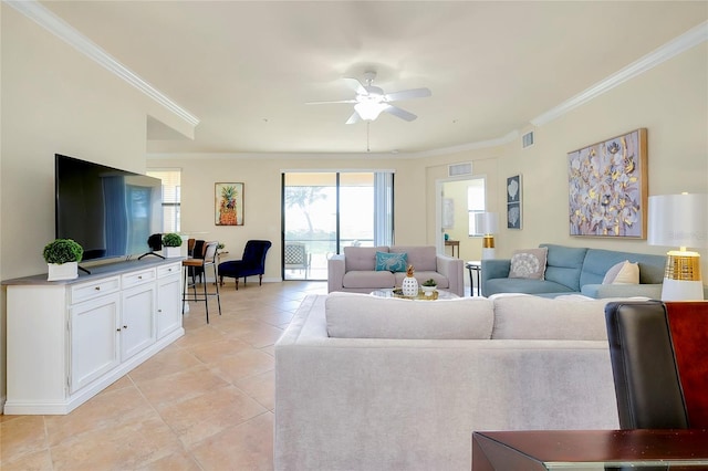 living room with crown molding, ceiling fan, and light tile patterned floors