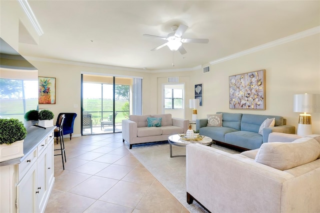 20100 Ragazza Cir Unit 101, Venice, FL 34293 - living room featuring light tile patterned floors, crown molding, and ceiling fan