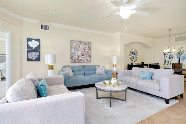 20100 Ragazza Cir Unit 101, Venice, FL 34293 - living area featuring crown molding, a chandelier, light tile patterned floors, and ceiling fan