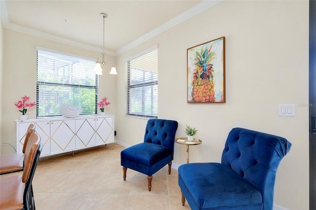 20100 Ragazza Cir Unit 101, Venice, FL 34293 - sitting room with crown molding and light tile patterned floors