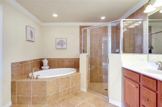 bathroom with tile patterned floors, vanity, shower with separate bathtub, and crown molding