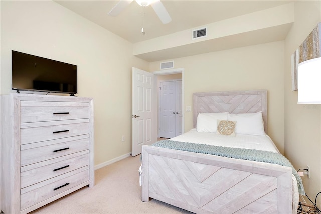 20100 Ragazza Cir Unit 101, Venice, FL 34293 - bedroom with light carpet and a ceiling fan