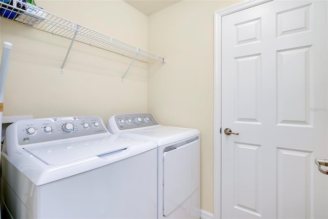 20100 Ragazza Cir Unit 101, Venice, FL 34293 - laundry area with washer and dryer