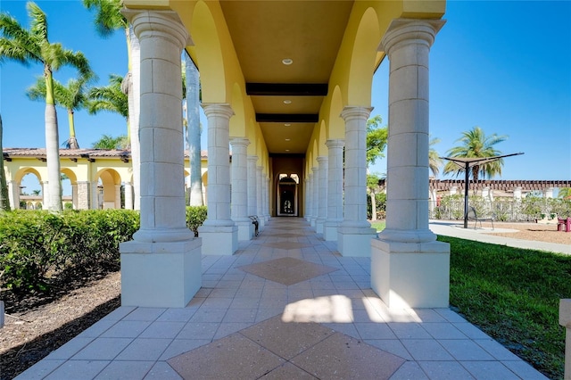 20100 Ragazza Cir Unit 101, Venice, FL 34293 - doorway to property with stucco siding