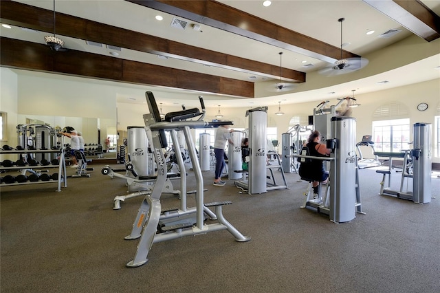 20100 Ragazza Cir Unit 101, Venice, FL 34293 - exercise room with beamed ceiling, recessed lighting, and a high ceiling