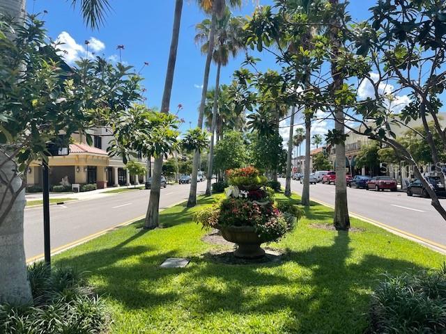20100 Ragazza Cir Unit 101, Venice, FL 34293 - view of asphalt street with sidewalks and curbs