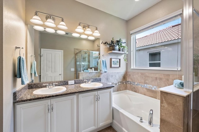 2049 Mesic Hammock Way, Venice, FL 34292 - bathroom with a garden tub, a shower stall, and double vanity
