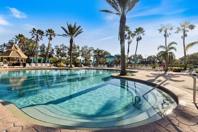 view of swimming pool with a gazebo and a patio