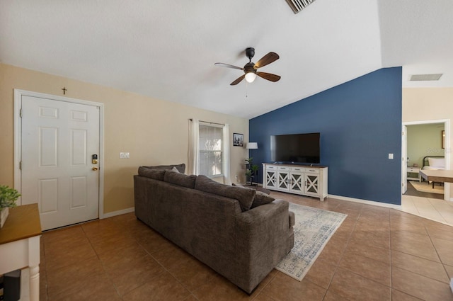 living room with tile patterned floors, ceiling fan, and lofted ceiling