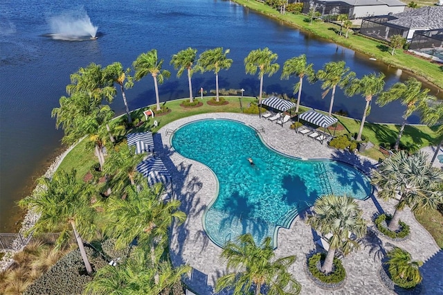 view of pool featuring a water view