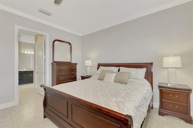 tiled bedroom featuring ceiling fan, crown molding, and connected bathroom