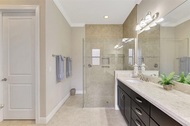 bathroom featuring crown molding, tile patterned flooring, vanity, and walk in shower