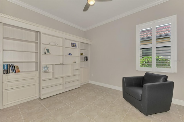 sitting room with ceiling fan, crown molding, and light tile patterned floors