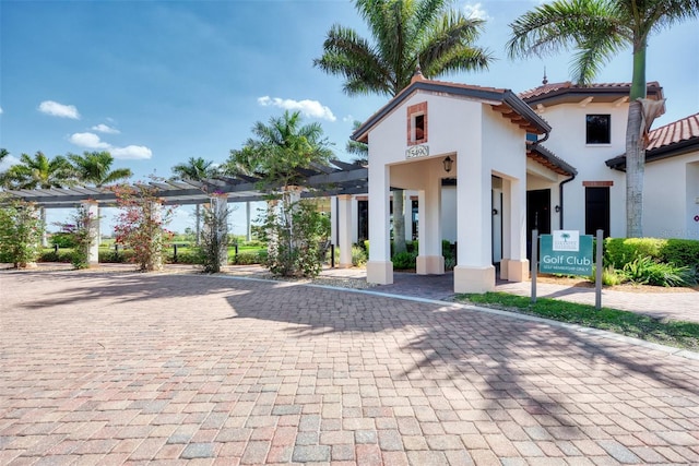 view of front of house with a pergola